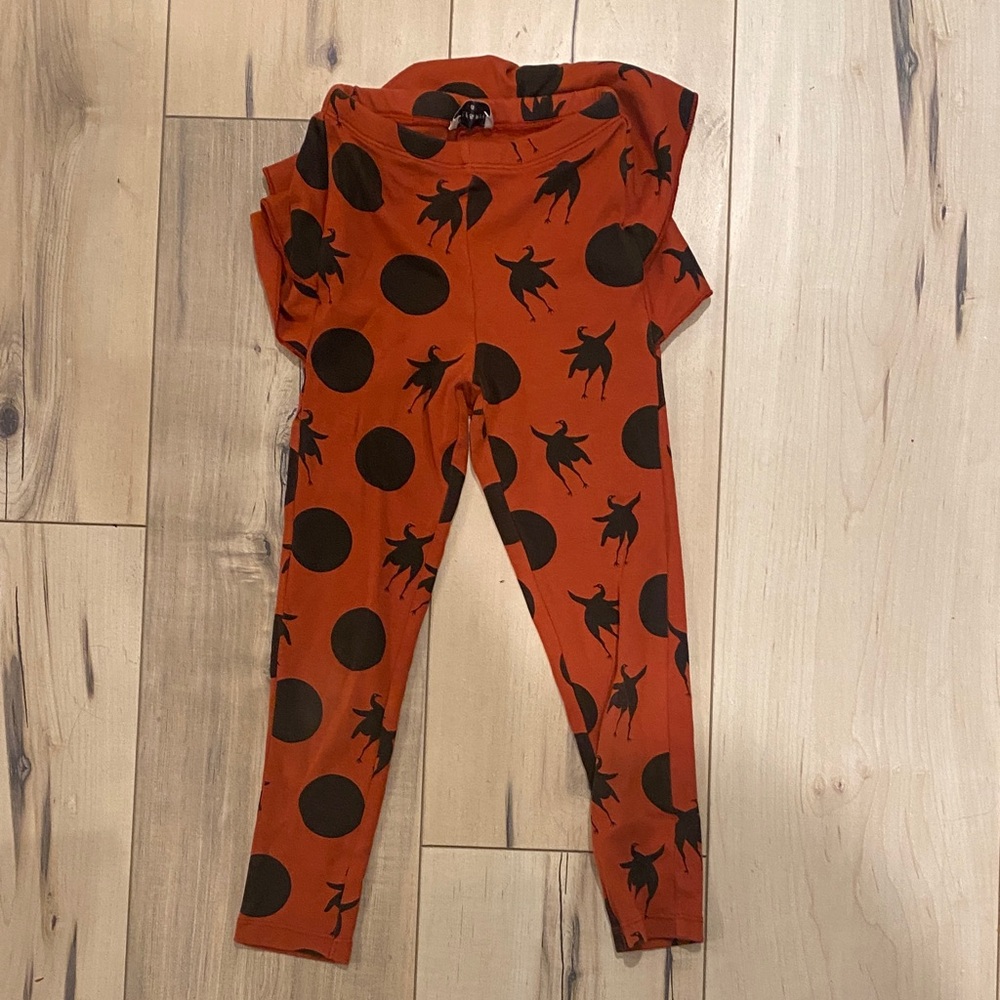Skirtted Orange wolf and Rita Leggings with Black Patterns